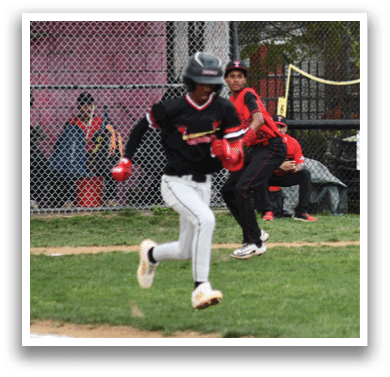 A boy is running on a baseball field. Description generated by AI