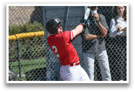 A baseball player in a red shirt and white pants is swinging a bat. Description generated by AI