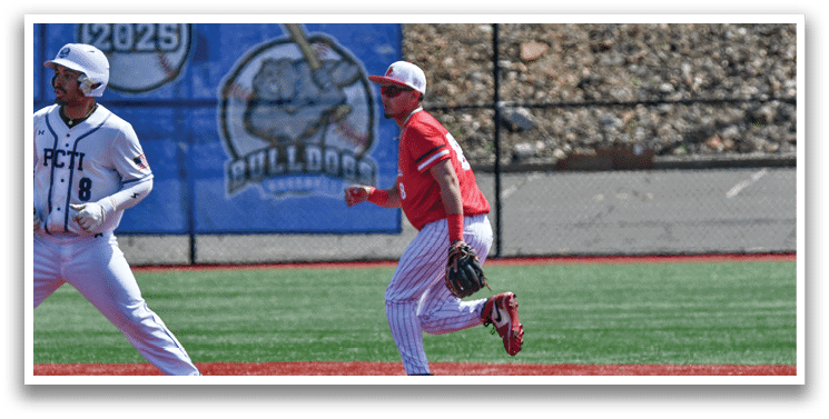 A baseball player in a red shirt is running to a base. Description generated by AI
