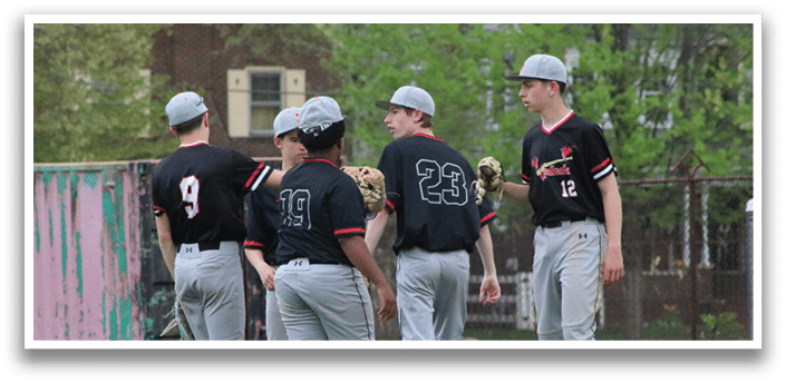 A group of young men wearing baseball uniforms. Description generated by AI