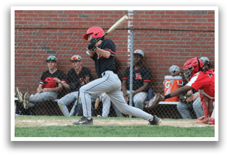 A baseball player is swinging a bat, with a catcher and umpire behind him. Description generated by AI