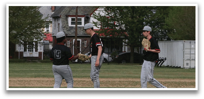 A group of baseball players on a field. Description generated by AI