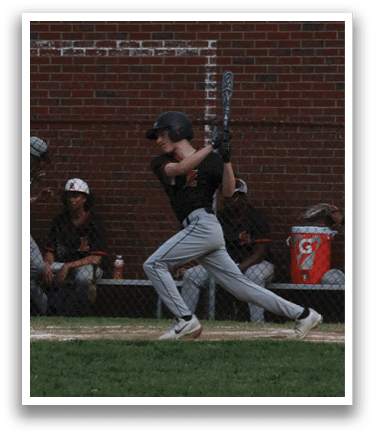 A baseball player is swinging a bat. Description generated by AI