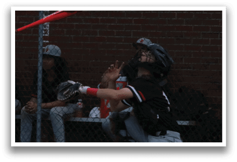 A baseball player is swinging a bat. Description generated by AI