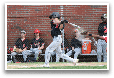 A baseball player is swinging a bat. Description generated by AI