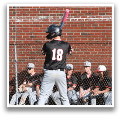 A baseball player with the number 18 on his shirt is holding a bat and waiting for the pitch. Description generated by AI