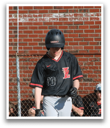 A boy wearing a baseball uniform with the number 10 on it. Description generated by AI
