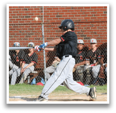 A baseball player is swinging a bat at a ball. Description generated by AI