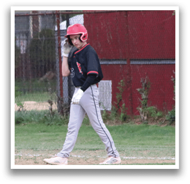 Two baseball players standing on a field. Description generated by AI