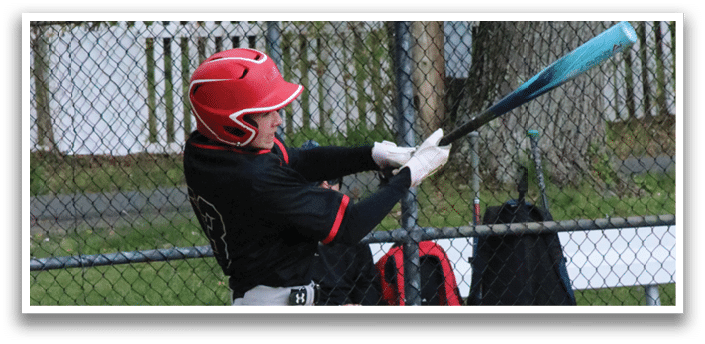 A baseball player is swinging a bat at a ball. Description generated by AI