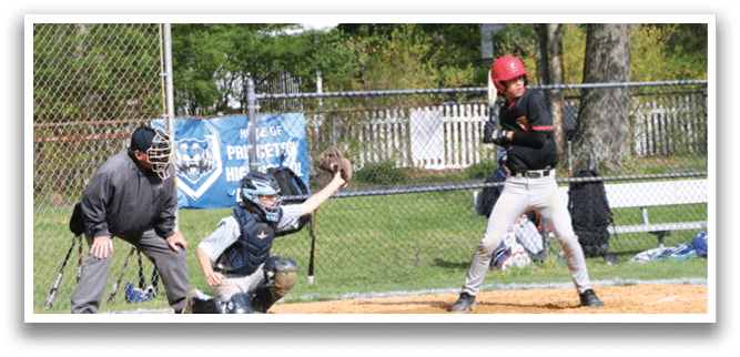 A baseball player is swinging a bat at a ball. Description generated by AI