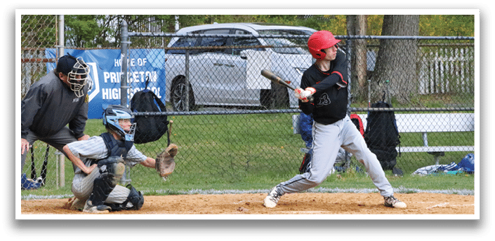A baseball player is swinging a bat at a ball. Description generated by AI