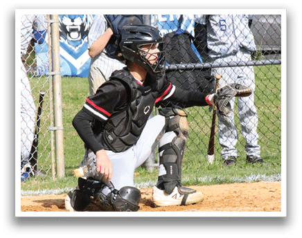 A baseball player is holding a bat. Description generated by AI