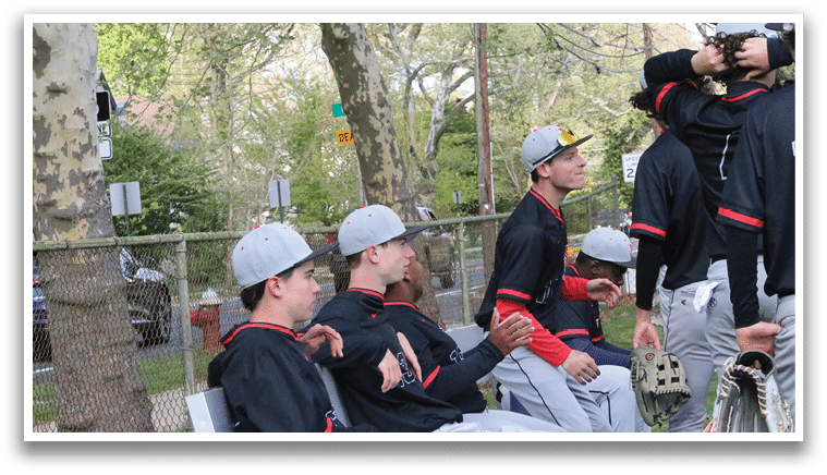 A group of young men wearing baseball caps and jerseys. Description generated by AI