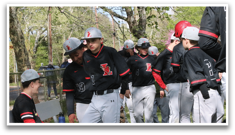 A group of young men wearing baseball uniforms. Description generated by AI