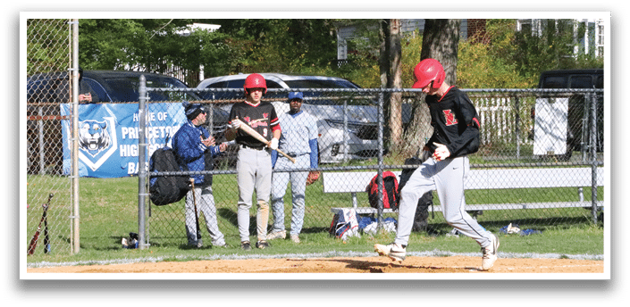 A baseball player is swinging a bat at a ball. Description generated by AI