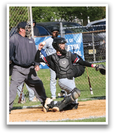 A baseball game is taking place with a batter, catcher, and umpire. Description generated by AI