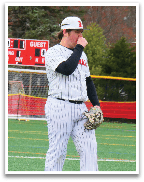 A baseball player wearing a white uniform stands on a field. AI generated content