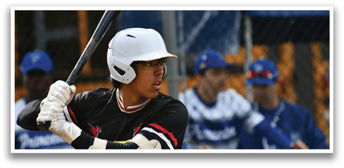 A baseball player is holding a bat and getting ready to swing. Description generated by AI