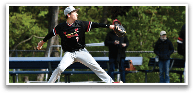 A baseball player wearing a black shirt and red shoes is pitching a ball. Description generated by AI