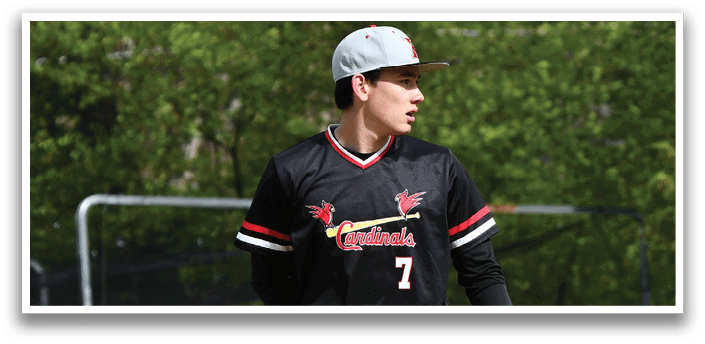 A baseball player wearing a black and red jersey with the number 7 on it. Description generated by AI