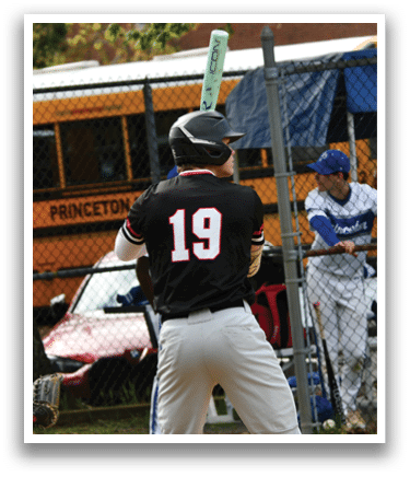 A baseball player with the number 19 on his shirt. Description generated by AI