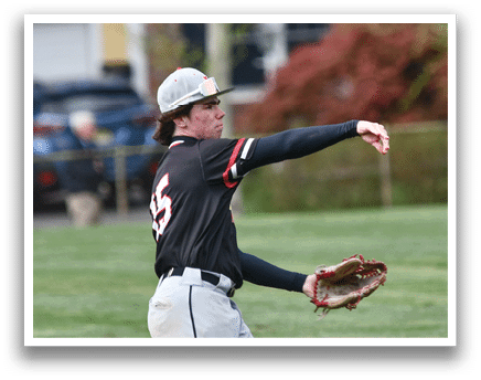 A baseball player in a black and red shirt and grey pants is catching a ball. Description generated by AI
