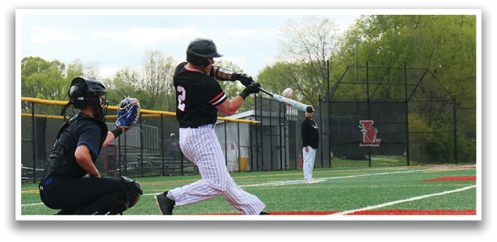 A baseball player is swinging a bat at a ball. Description generated by AI