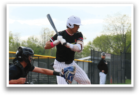 A baseball player is swinging a bat. Description generated by AI