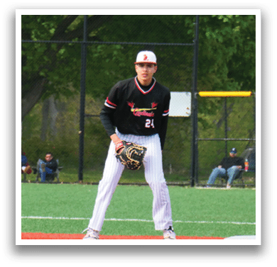 A baseball player wearing a black shirt and pink gloves. Description generated by AI