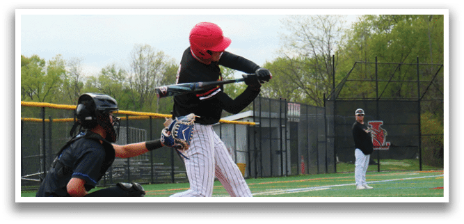 A baseball player is swinging a bat at a ball. Description generated by AI