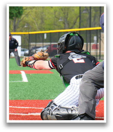 A baseball player is sliding into home base. Description generated by AI