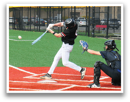 A baseball player is swinging a bat at a ball. Description generated by AI
