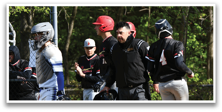 A group of people wearing baseball uniforms. Description generated by AI
