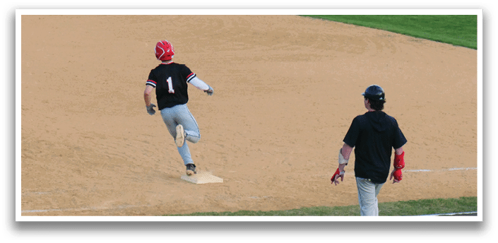 A baseball player running on the field. Description generated by AI