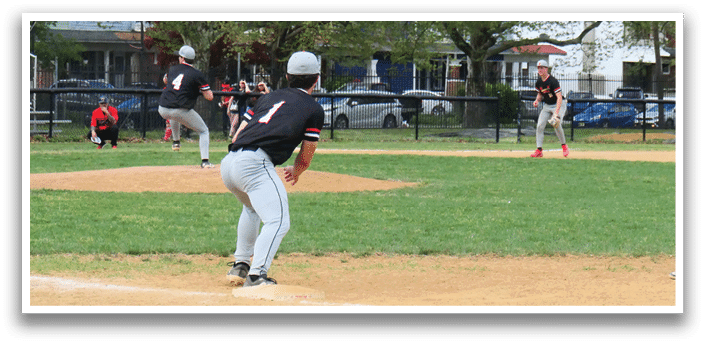 A baseball game is taking place in a park. Description generated by AI