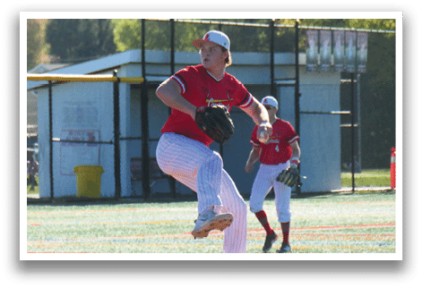 A baseball player in a red shirt and white pants is pitching a ball. Description generated by AI