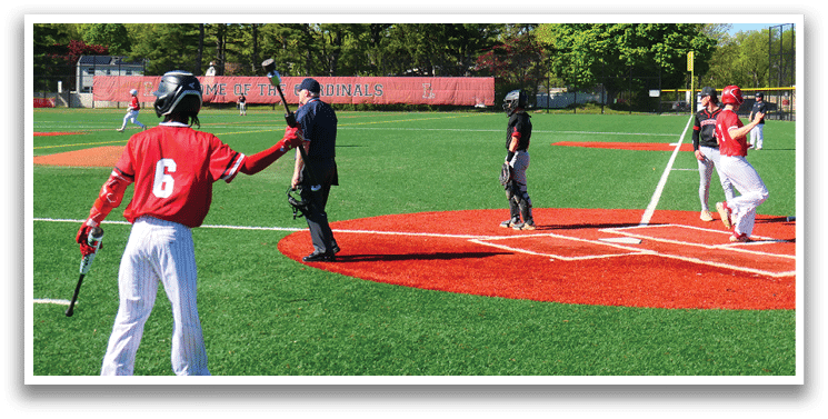 A baseball game is taking place on a field. Description generated by AI