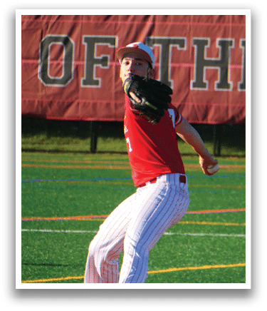 A baseball player in a red shirt and white pants is pitching a ball. Description generated by AI
