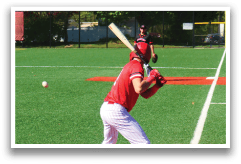A baseball player is swinging a bat at a ball. Description generated by AI
