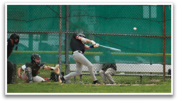 A baseball player is swinging a bat at a ball. Description generated by AI