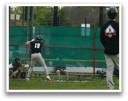 A baseball player is swinging a bat. Description generated by AI