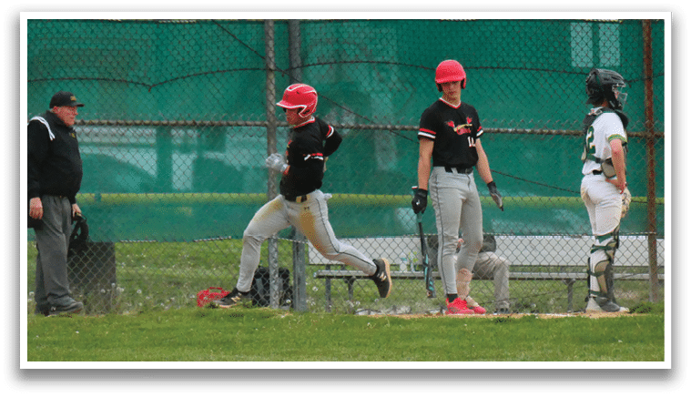 A baseball game is taking place with players on the field. Description generated by AI
