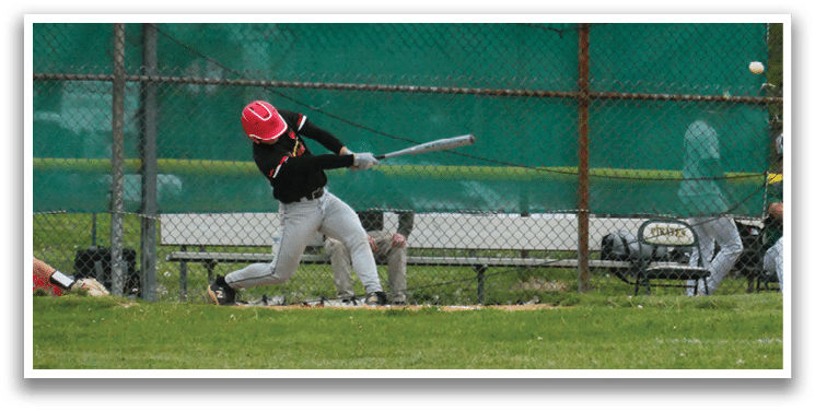 A baseball player is swinging a bat. Description generated by AI