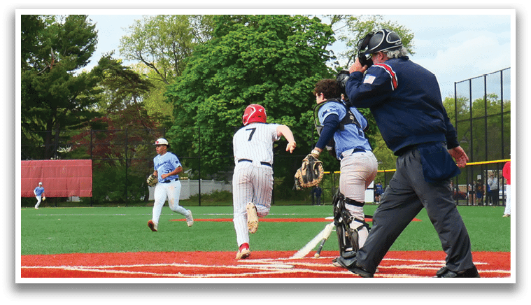A baseball game is taking place on a field with a group of people playing. Description generated by AI