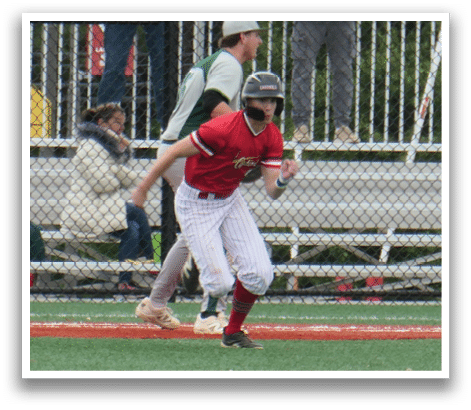 A baseball player running on the field. Description generated by AI
