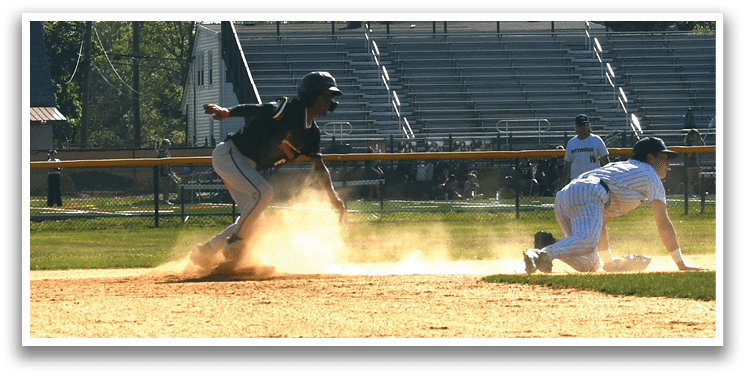 A baseball player slides into a base. Description generated by AI