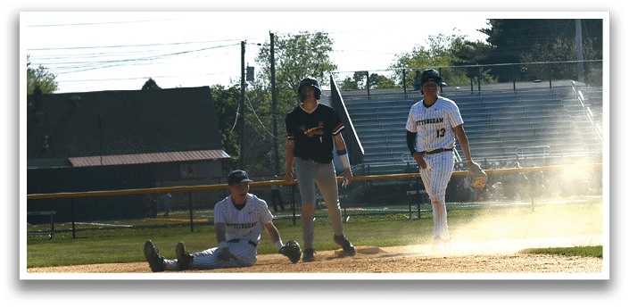 A baseball player is sitting on the ground with his legs crossed. Description generated by AI