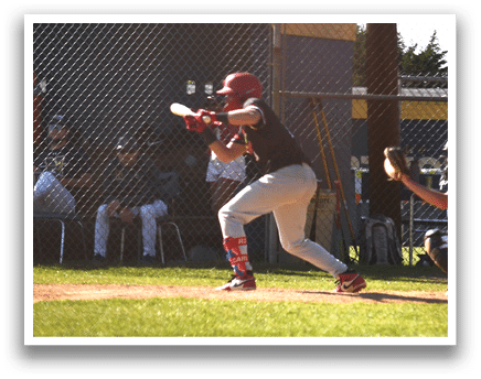 A baseball player is swinging a bat at a ball. Description generated by AI