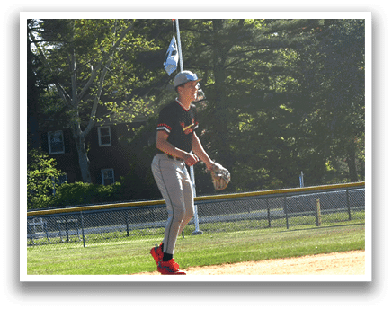 A baseball player is standing on a field with a baseball bat. Description generated by AI